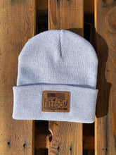 Load image into Gallery viewer, Arctic heather beanie with Freedom Flannel American flag logo suede patch.
