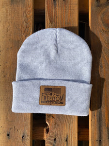 Arctic heather beanie with Freedom Flannel American flag logo suede patch.