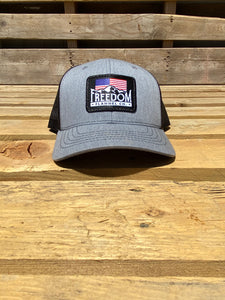 American flag Freedom Flannel patch hat in heather gray/black on a  youth size Richardson 112 low profile snapback trucker hat. 