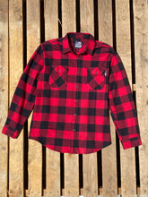 Load image into Gallery viewer, The Standard Freedom Flannel in red and black buffalo check laying on a pallet of wood. 
