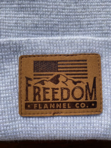 Close up of Freedom Flannel American logo suede patch. 