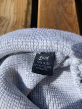 Load image into Gallery viewer, Close up of manufacturers tag. Made in the U.S.A., 40% recycled wool, 60% acrylic. 

