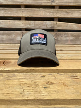 Load image into Gallery viewer, Green/black American flag freedom flannel patch hat on a Richardson 112 low profile truck snapback hat.
