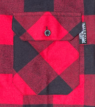 Load image into Gallery viewer, Close up of a red and black buffalo check flannel&#39;s chamfered pocket with Freedom Flannel star logo pinch hem tag. 
